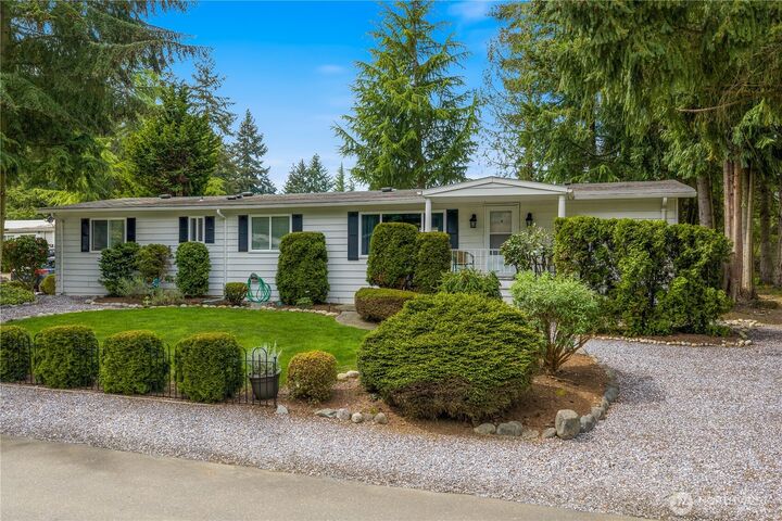 Property Photo:  12511  123rd Street Ct E 51  WA 98374 