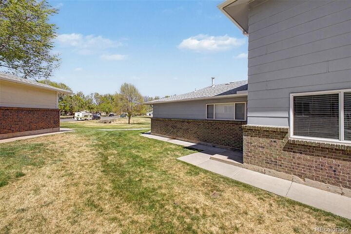 Property Photo:  7309 W Hampden Avenue 203  CO 80227 