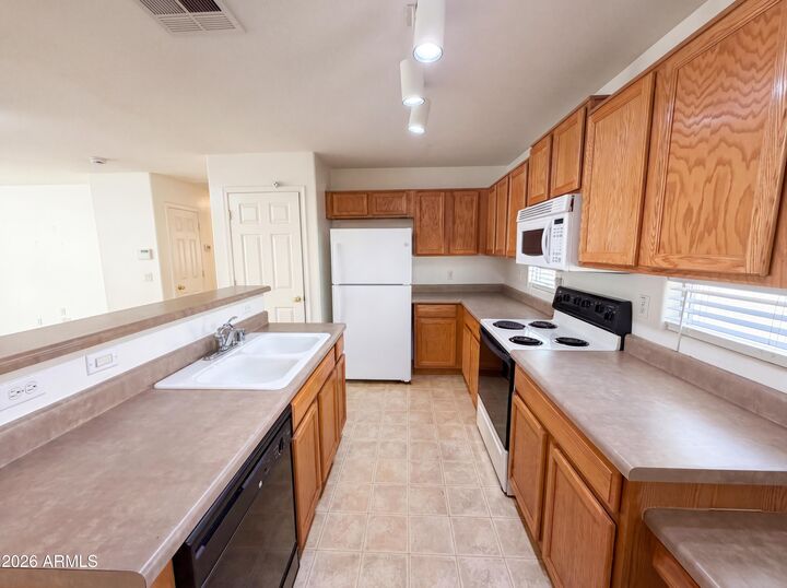Property Photo:  11280 W Magnolia Street  AZ 85323 