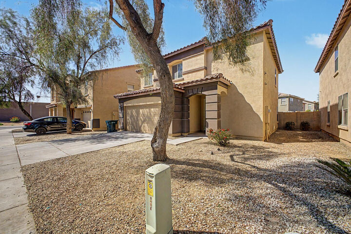 Property Photo:  9464 W Sheridan Street  AZ 85037 