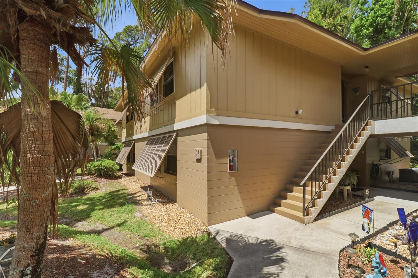 Property Photo:  120 Hibiscus Woods Court 9B  FL 32725 
