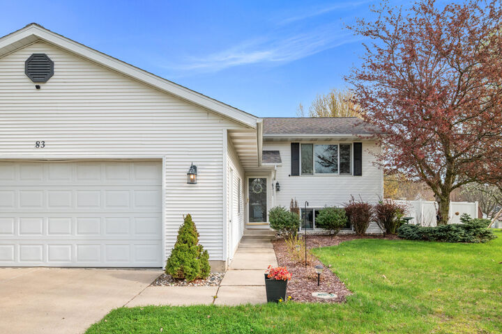 Property Photo:  83 Windflower Street NE  MI 49321 