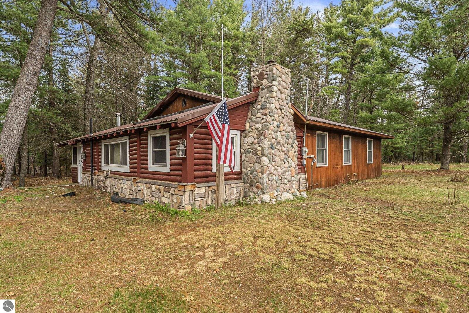 Property Photo:  9890 SE Angel Road  MI 49633 