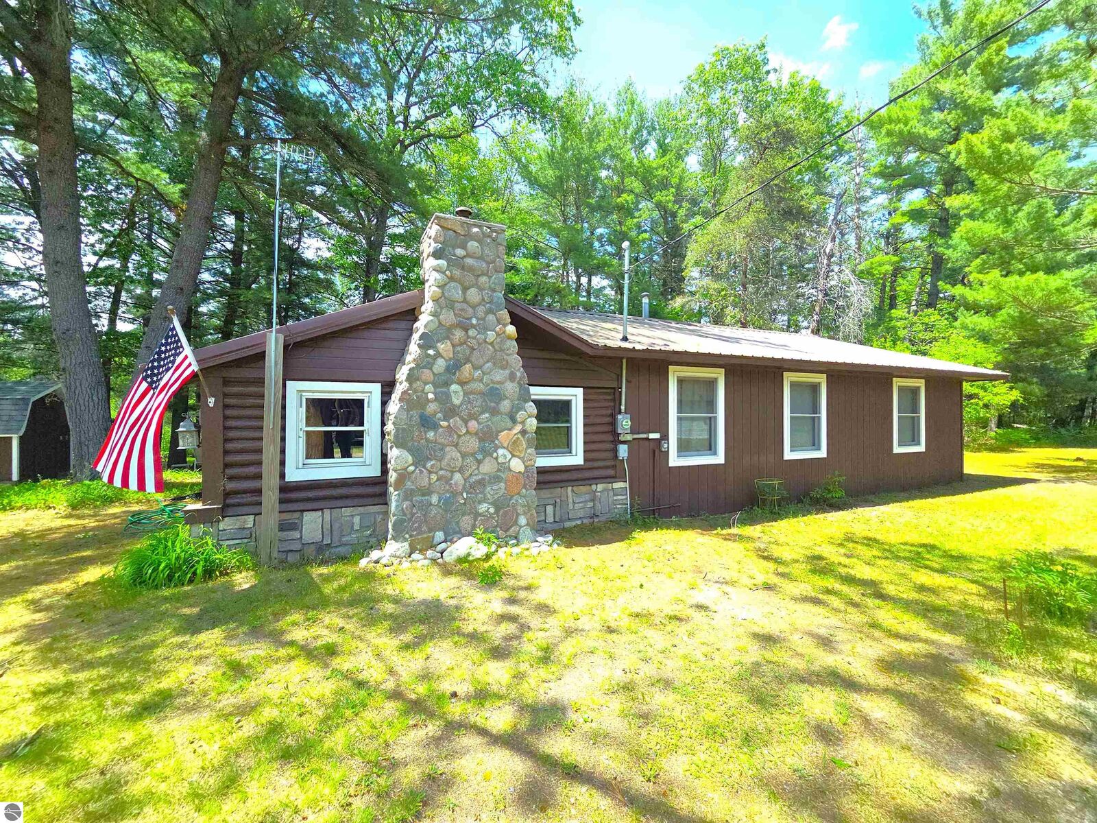 Property Photo:  9890 SE Angel Road  MI 49633 