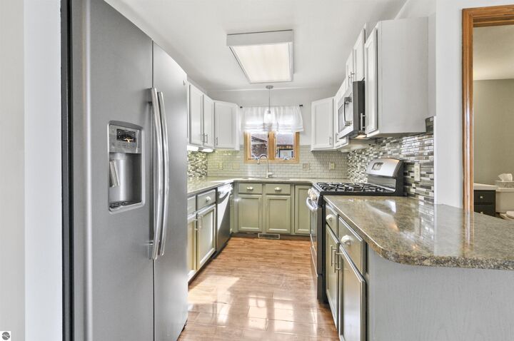 Property Photo:  221 Wildwood Drive  MI 49601 