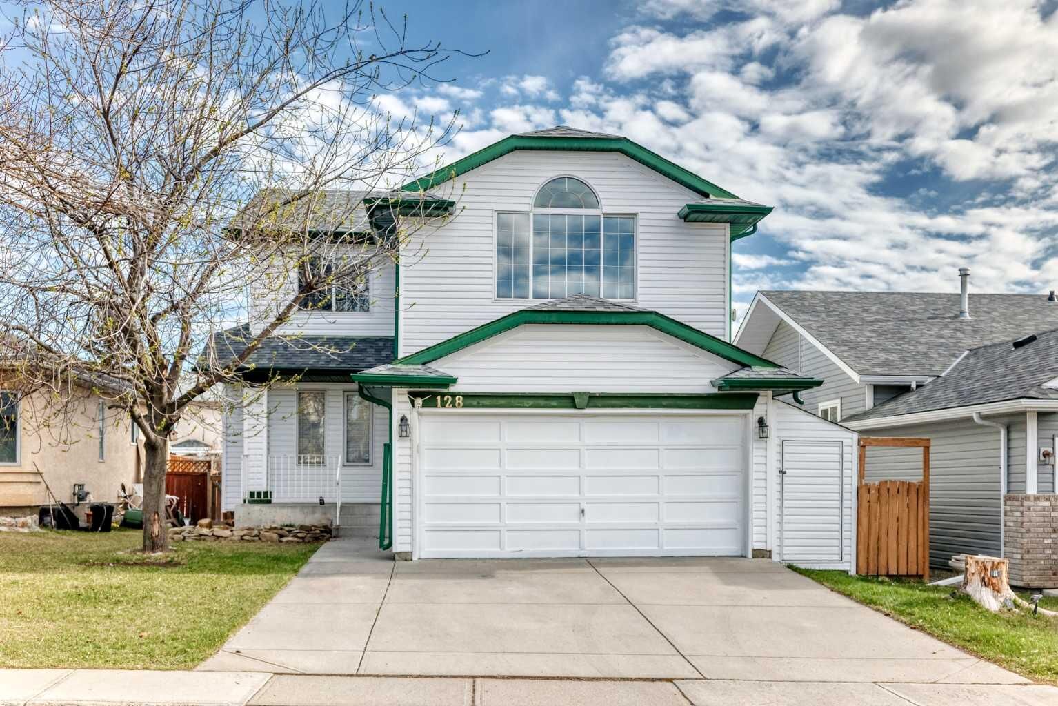 Property Photo: 128 Harvest Park Road NE AB T3K 4H9