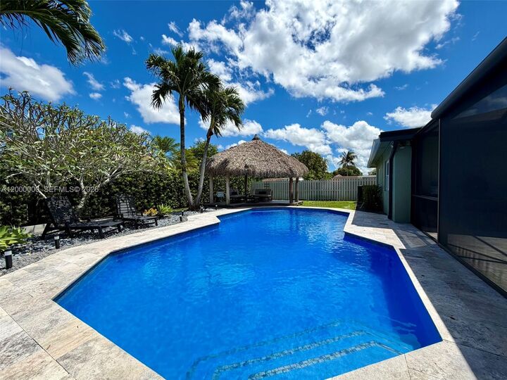 Property Photo:  5704 SW 116th Ave  FL 33330 