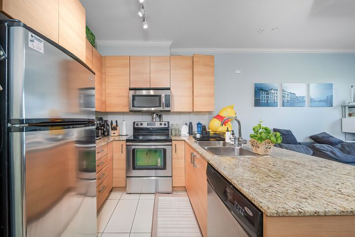 Property Photo: 5788 Sidley Street 214 BC V5J 5E5