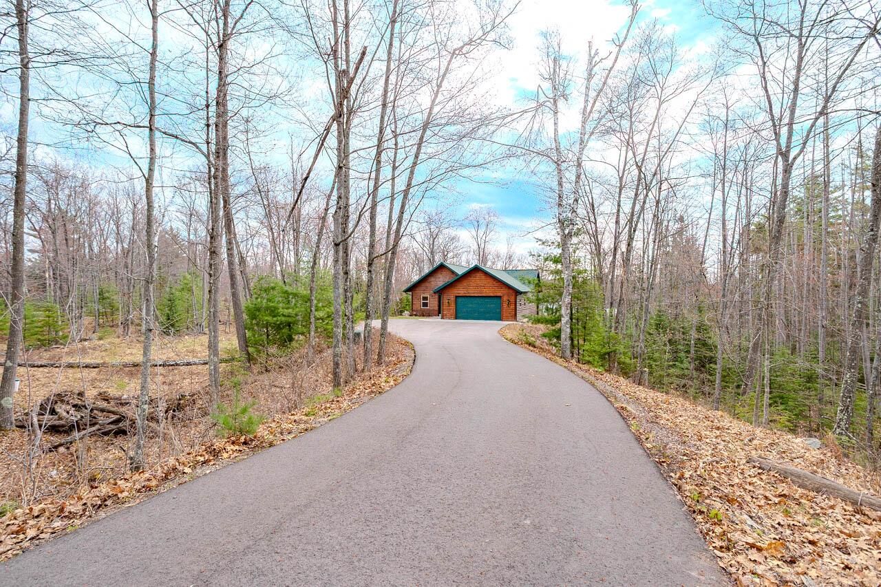 Property Photo:  4387 Double Oaks Tr  WI 54501 