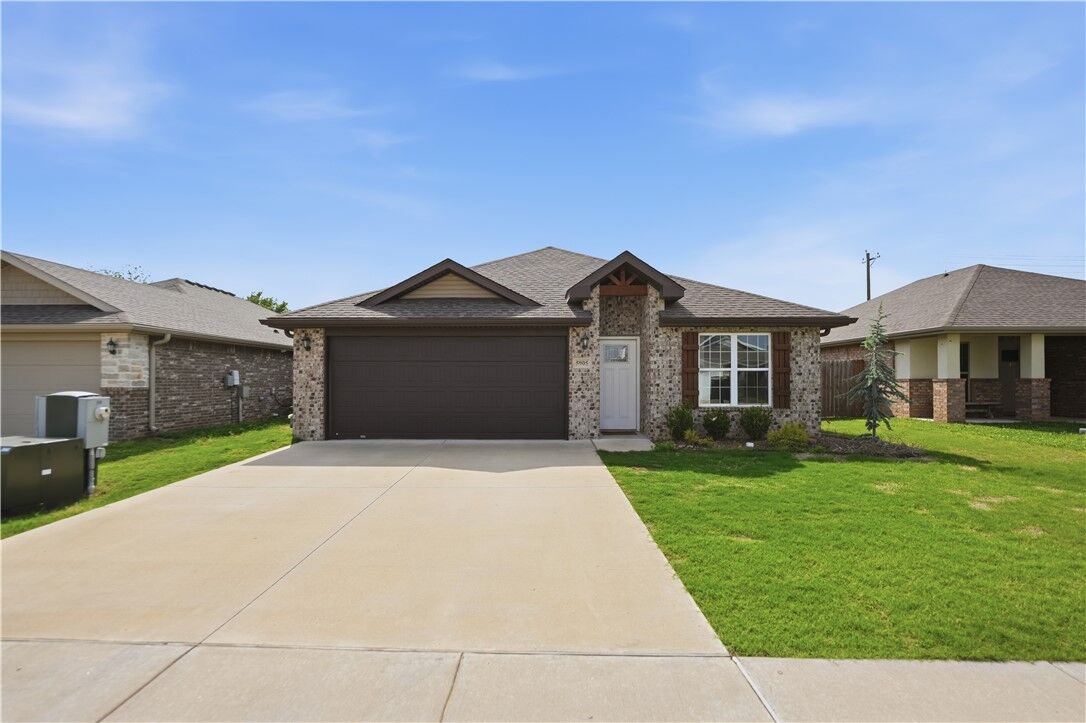 Property Photo:  5905 NW McClellen Street  AR 72713 