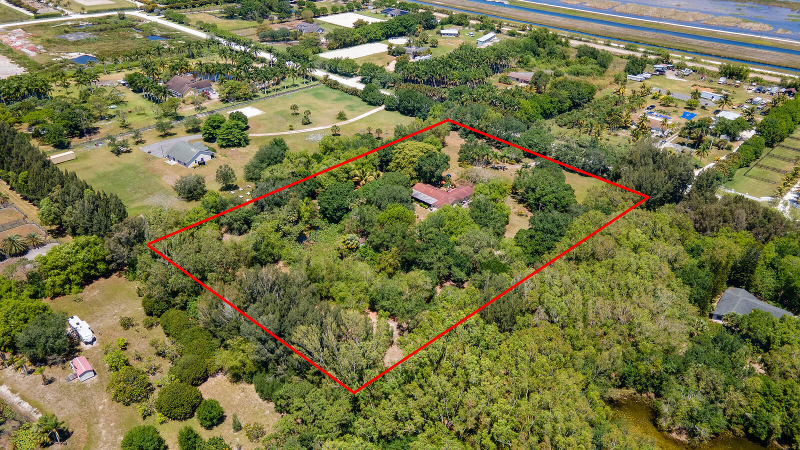 Property Photo:  16688 Rustic Road  FL 33470 