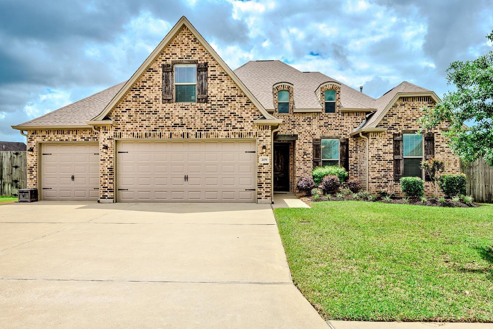 Property Photo:  209 Mandavilla Way  TX 77657 