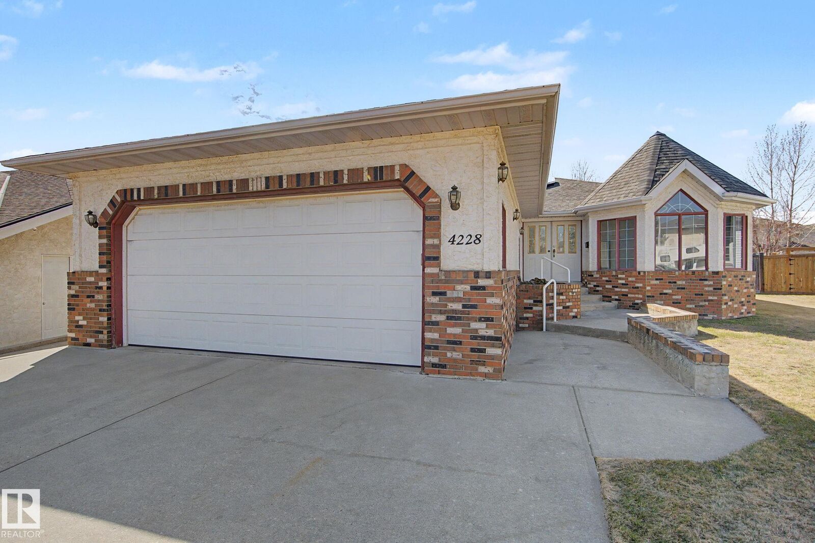 Property Photo: 4228 46 Street NW AB T6L 6L9