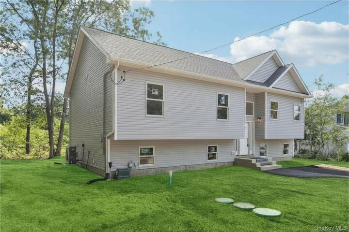 Property Photo:  511 Walker Avenue  NY 11772 