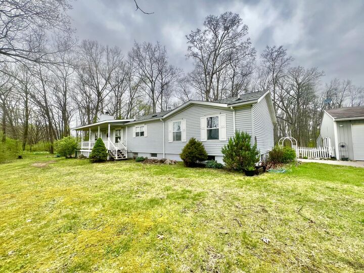 Property Photo:  8056 Sawdey Road  MI 49249 
