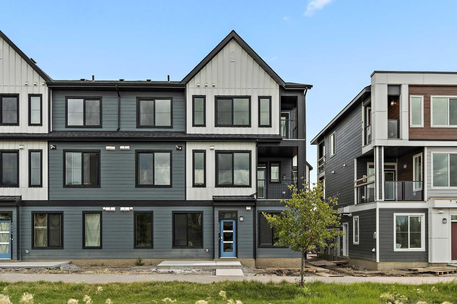 Property Photo: 60 Howse Lane 1104 AB T3P 2Z6