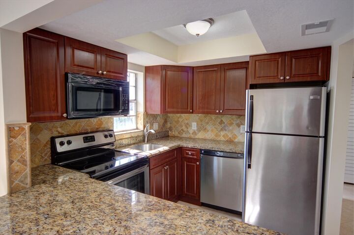 Property Photo:  342 Southwind Drive 114  FL 33408 