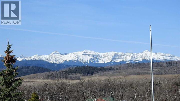 Property Photo:  240074 Highway 546  AB T0L 2A0 