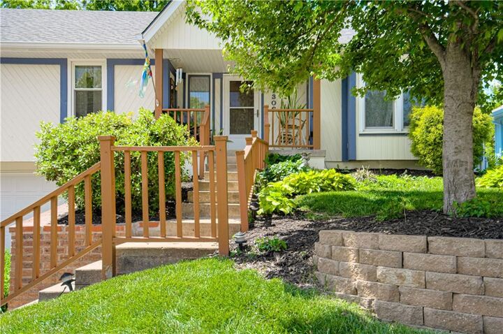 Property Photo:  1306 Downing Street  MO 64068 