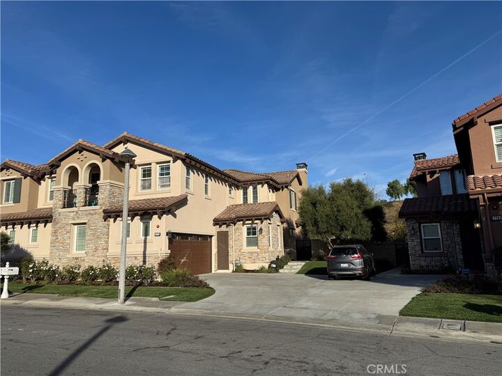Property Photo:  17771 Via Roma  CA 92886 