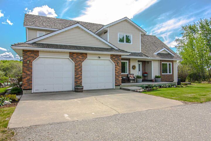 Property Photo: 720047 Range Road 63 AB T8X 4K1