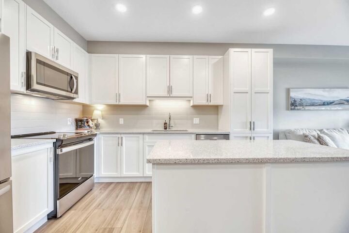 Property Photo:  55 Wolf Hollow Crescent SE 415  AB T2X 5K9 