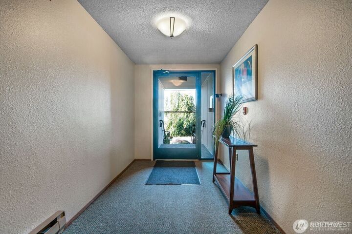 Property Photo:  2034  14th Avenue W 104  WA 98119 