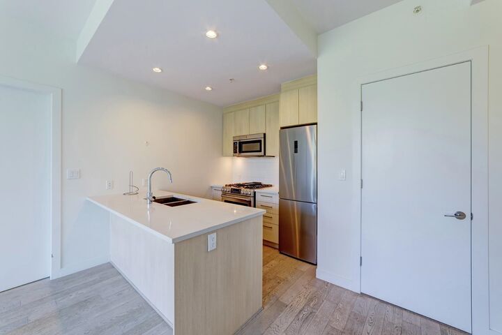 Property Photo:  9060 University Crescent 1xx  BC V5A 0E1 
