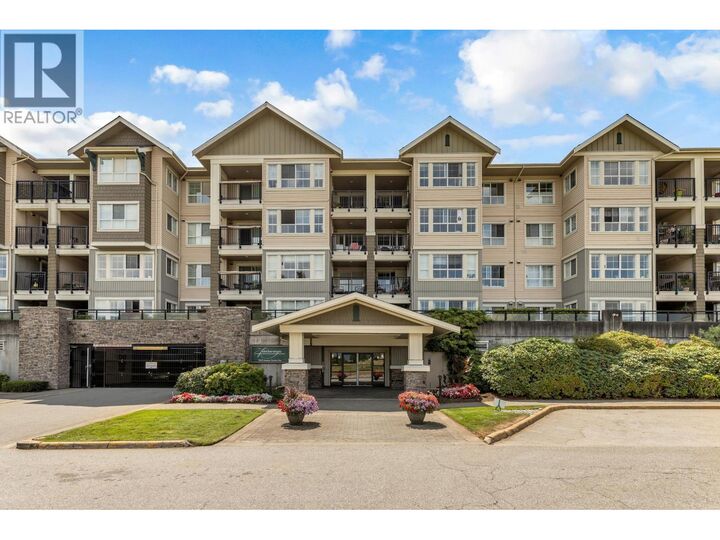 Property Photo:  19673 Meadow Gardens Way 317  BC V3Y 0A1 