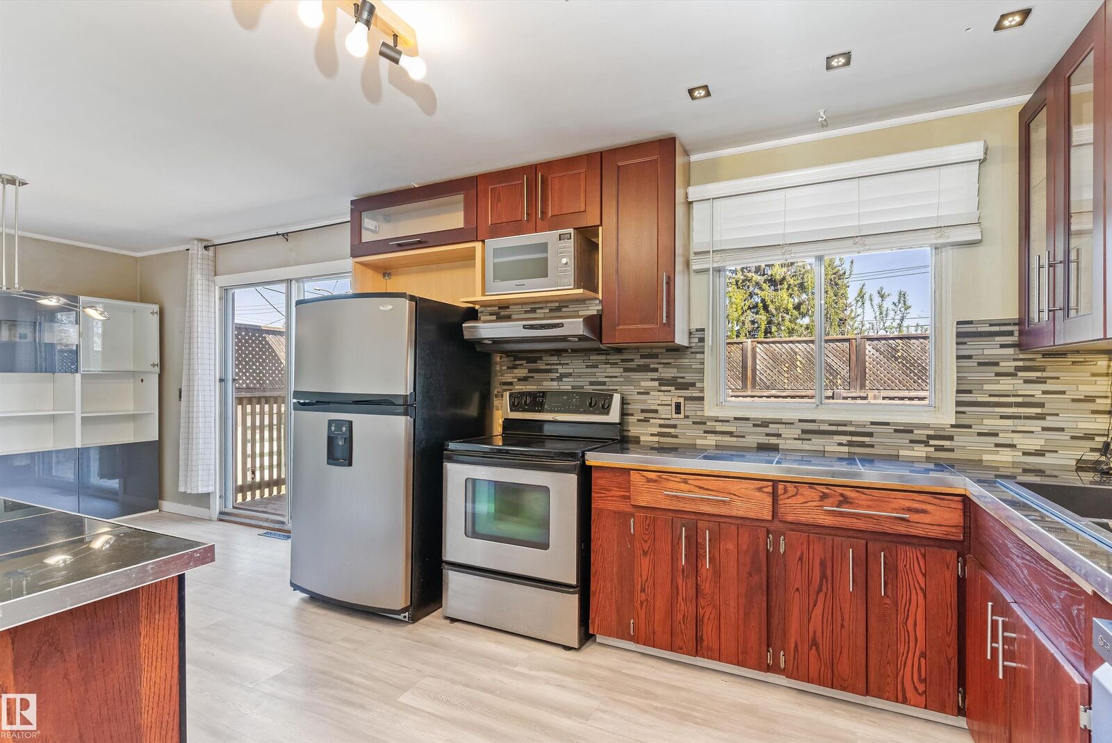Property Photo:  13208 128 Avenue NW  AB T5L 3H2 