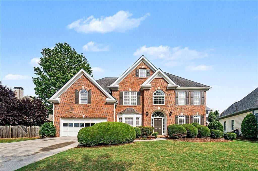 Property Photo:  710 Wilde Rose Court  GA 30075 