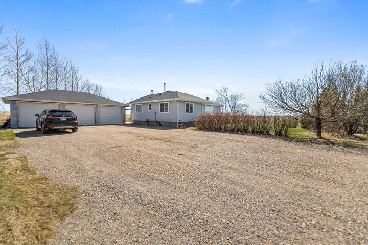Property Photo:  242039 Range Road 261  AB T1P 0X1 