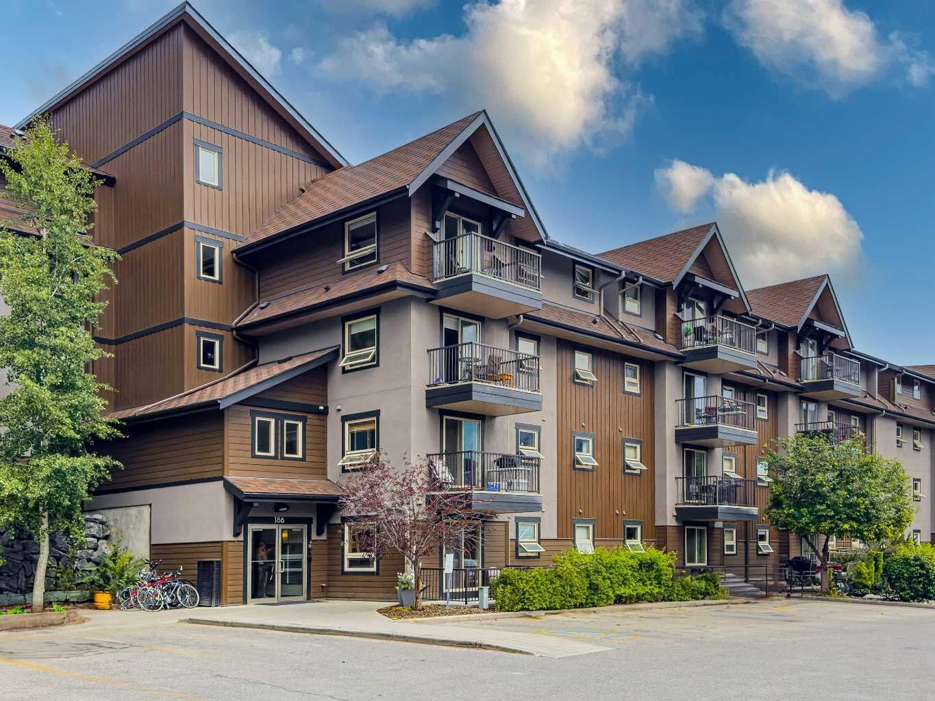 Property Photo: 186 Kananaskis Way 1 AB T1W 0A2