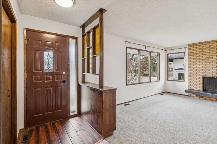 Property Photo:  1260 Lake Sylvan Drive SE  AB T2J 3C8 