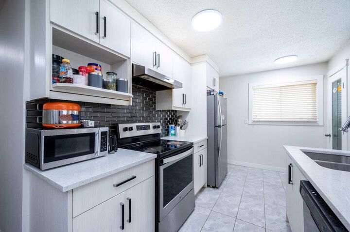 Property Photo:  72 Faldale Close NE  AB T3J 1V9 