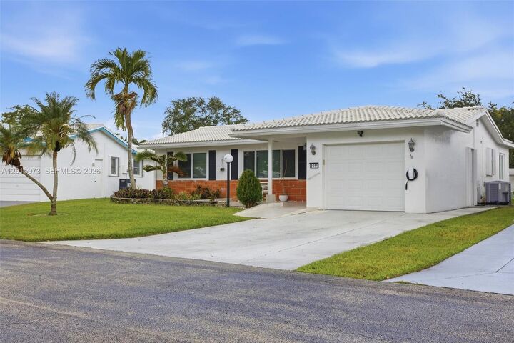 Property Photo:  9011 NW 15th Pl  FL 33322 