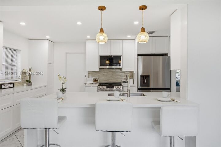 Property Photo:  9011 NW 15th Pl  FL 33322 