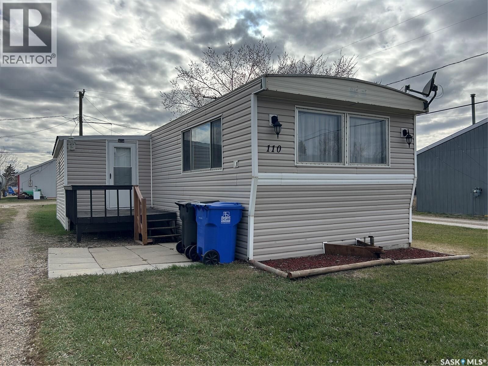 Property Photo:  110 4th Street  SK S0C 0A0 