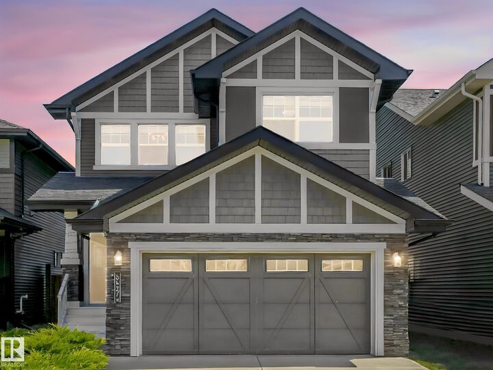 Property Photo:  8427 216 Street NW  AB T5T 4W2 