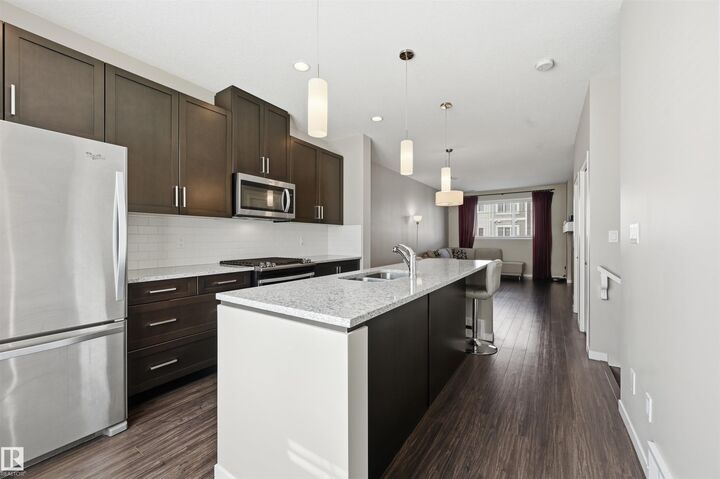 Property Photo:  320 Secord Boulevard NW 4  AB T5T 7E8 