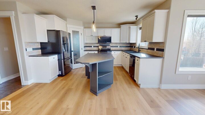 Property Photo:  32 Carriere Crescent  AB T4X 0A8 