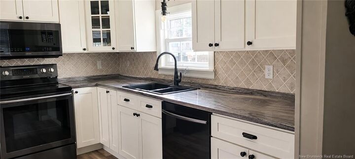 Property Photo:  105 Parker Road  NB E4P 3P6 