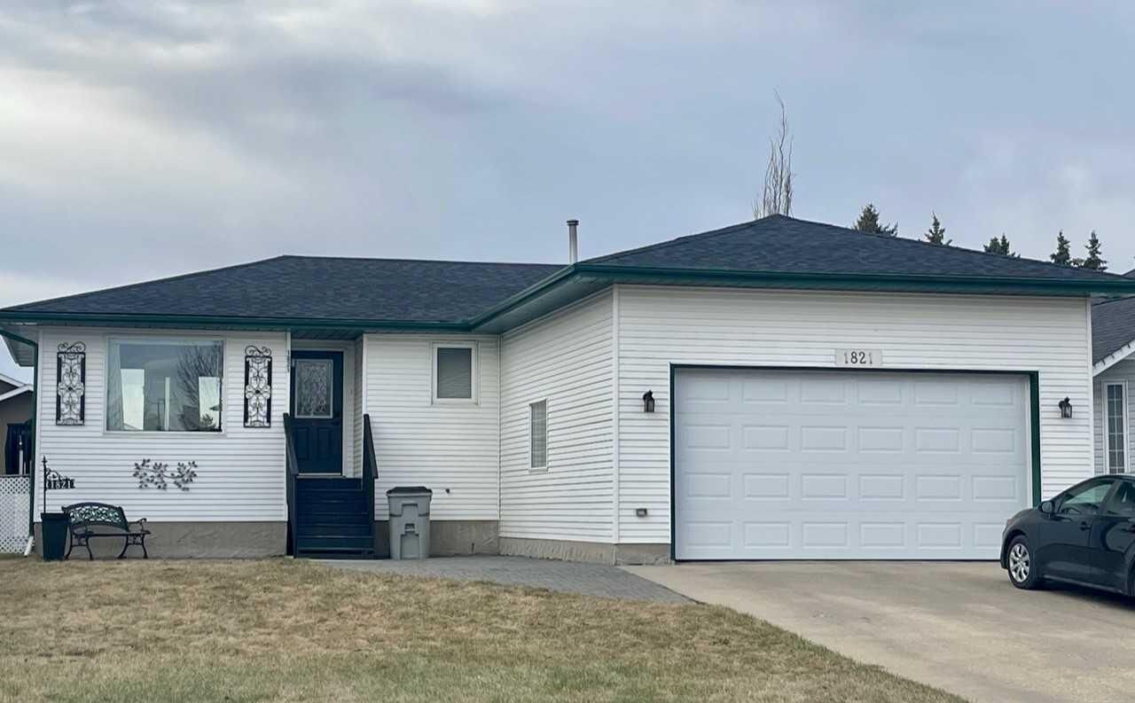 Property Photo:  1821 11 Avenue  AB T9W 1L3 