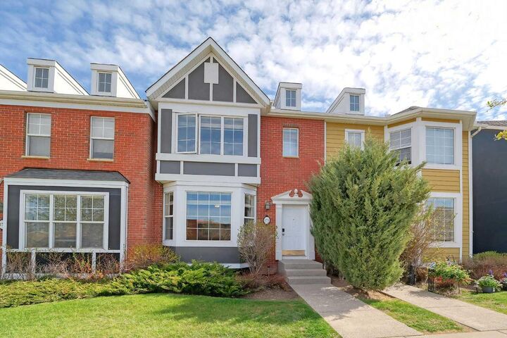 Property Photo: 179 Rainbow Falls Drive AB T1X 0A7