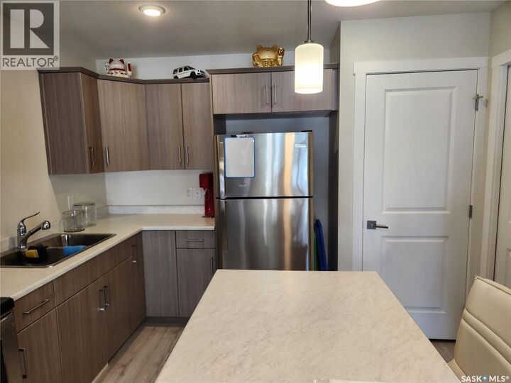 Property Photo:  #212 315 Dickson Crescent  SK S7T 0T8 