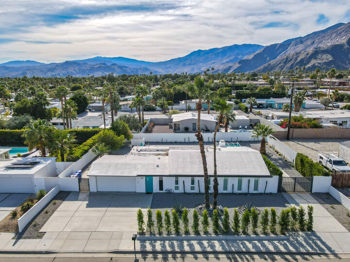 Property Photo:  411 E Racquet Club Road  CA 92262 