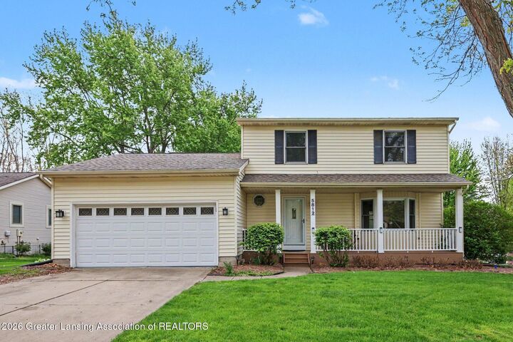 Property Photo:  5812 Wood Valley Drive  MI 48840 