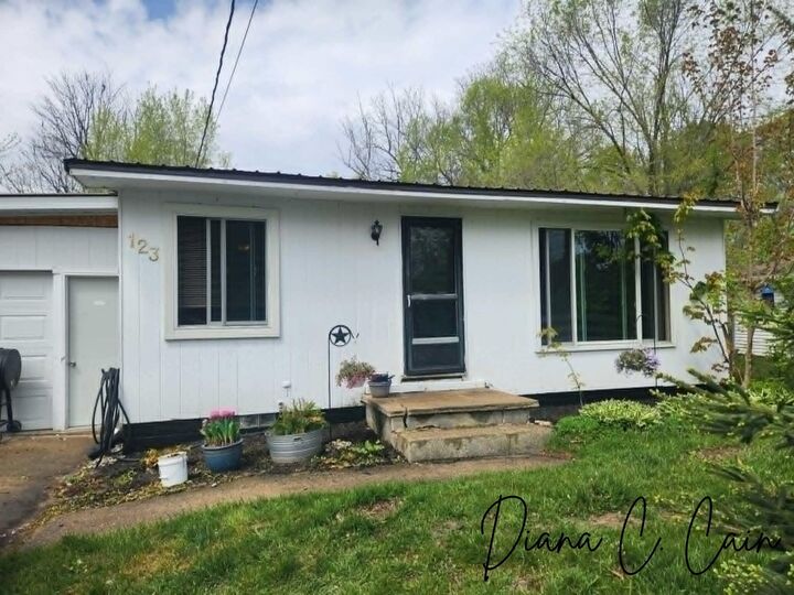 Property Photo:  123 Riverside Drive  MI 49420 