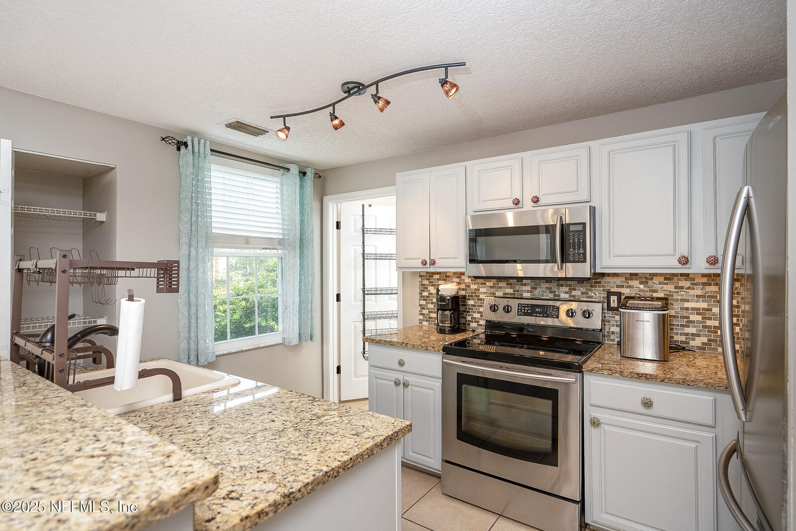 Property Photo: 4025 Grande Vista Boulevard 23-102 FL 32084