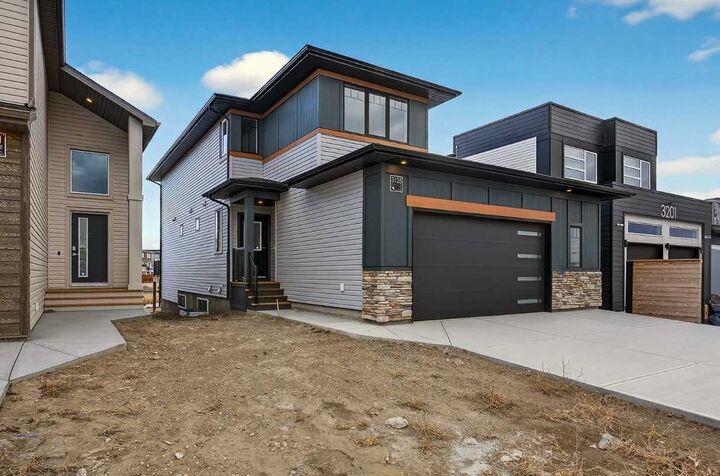 Property Photo:  3125 44 Street S  AB T1K 8L1 